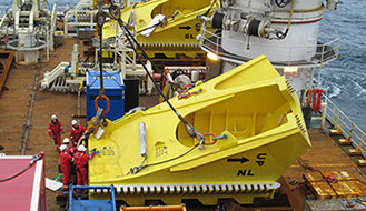 Lower anchor clamps on support vessel prior to installation on Siri